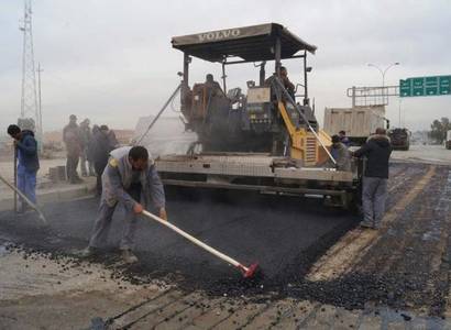 Pavement and fixing the shoulders of Baghdad and Mosul Roads, at Two ways from Baiji Refinery.