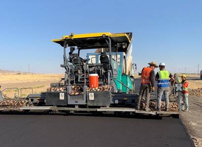CONSTRUCTION AND PAVING ROAD LINKING THE VILLAGE OF AL- MUSTANTIQ TO THE MOSUL - BAGHDAD ROAD LENGTH 8 KM